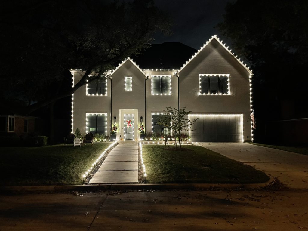 Christmas lighting installed on home